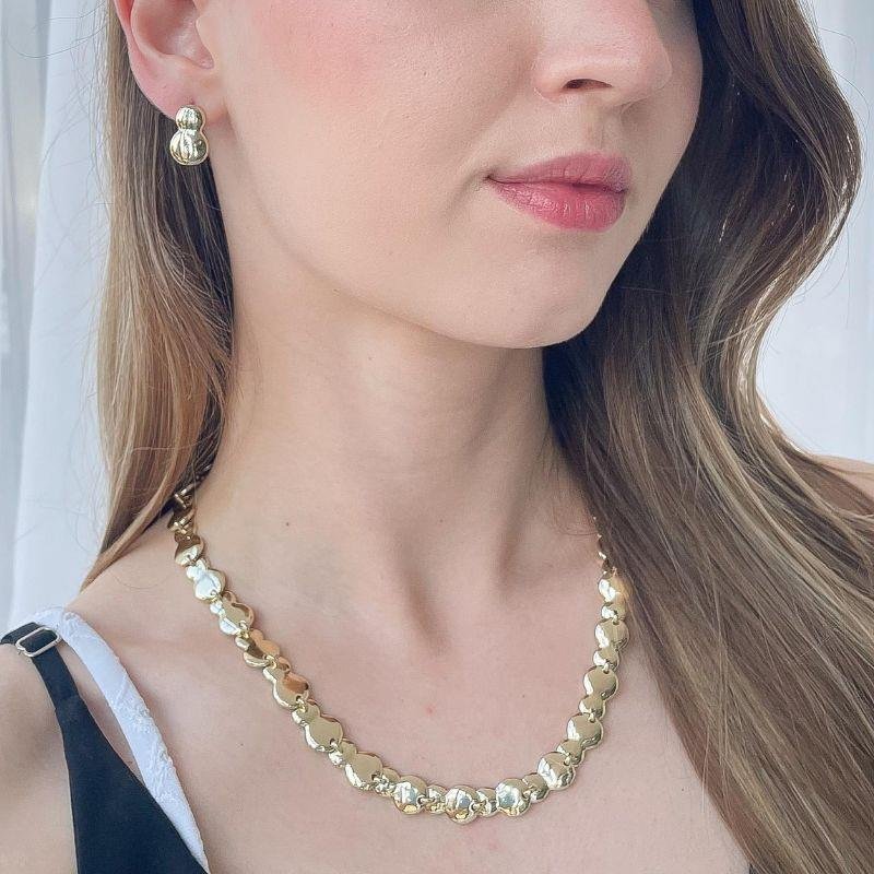 CONJUNTO FOLHEADO A OURO COM DESIGN ORGÂNICO