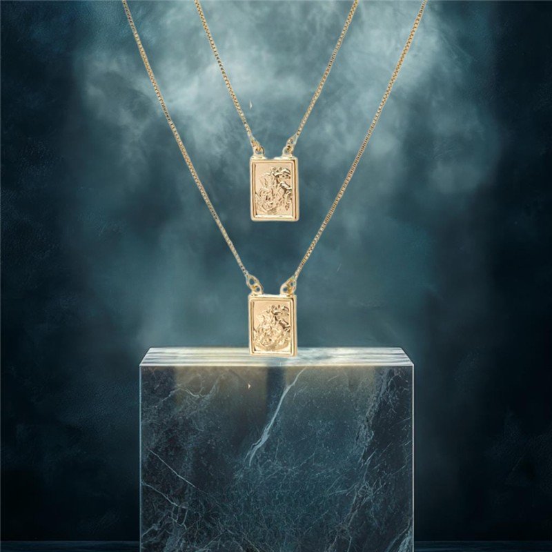 ESCAPULÁRIO RETANGULAR COM IMAGEM DE SÃO JORGE FOLHEADO A OURO